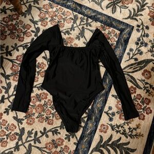 one piece swim suit that could also be a body suit